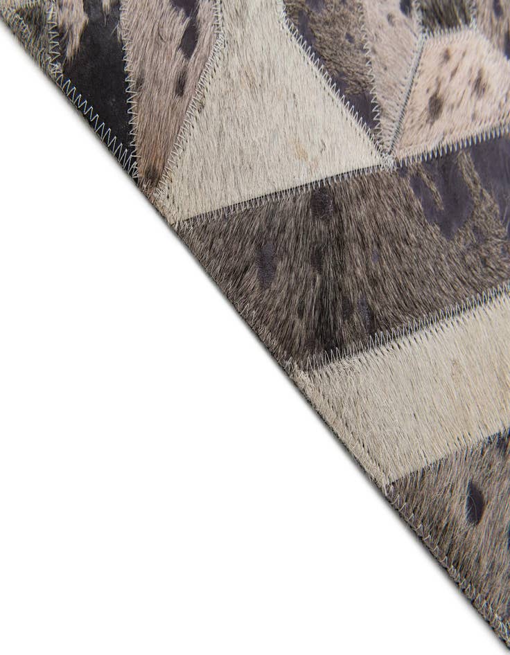 Detail image of  5' 2 x 8' 1 Cowhide Stocks Rug