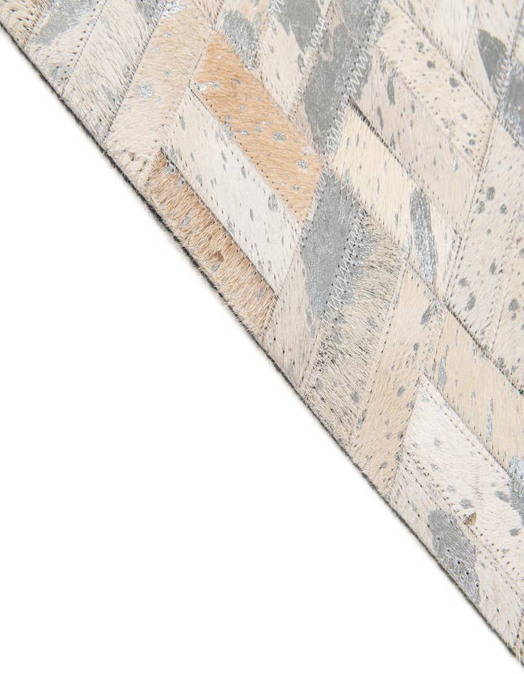 Detail image of  4' 11 x 8' 1 Cowhide Stocks Rug