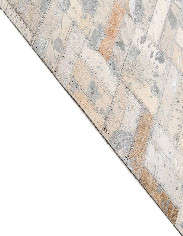 Detail image of  4' 11 x 8' 1 Cowhide Stocks Rug
