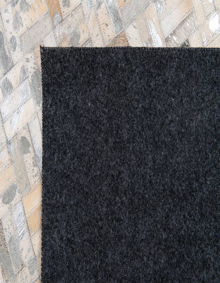 Detail image of  4' 11 x 8' 1 Cowhide Stocks Rug