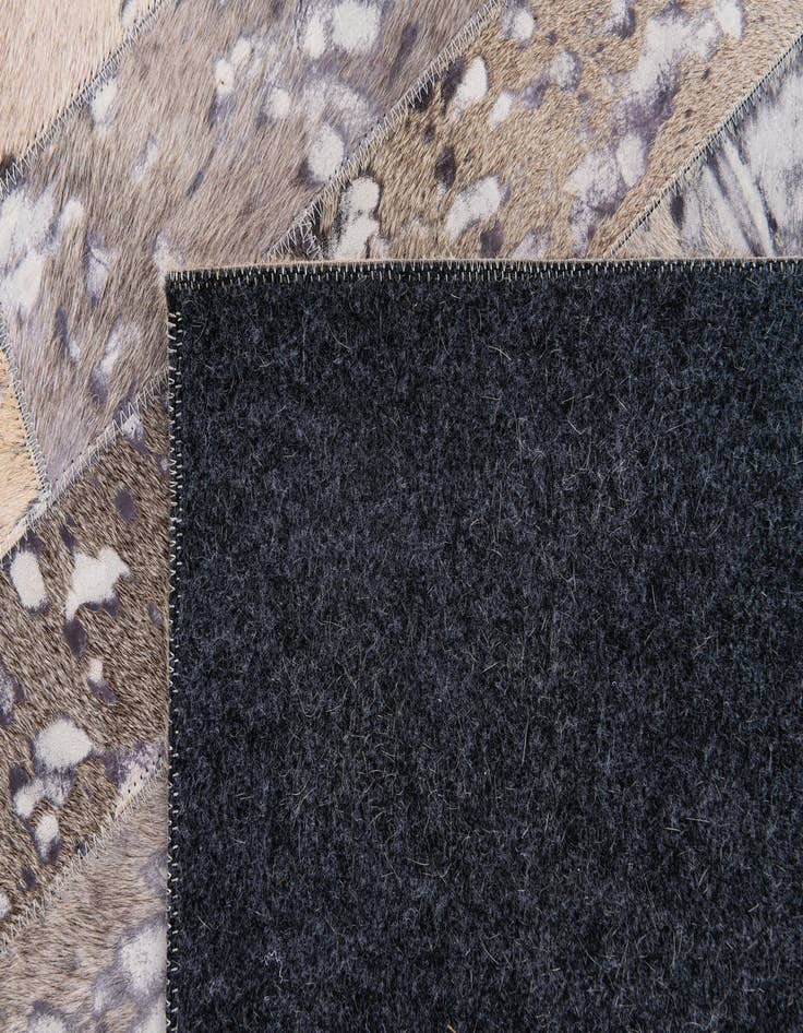 Detail image of  5' 1 x 8' Cowhide Stocks Rug