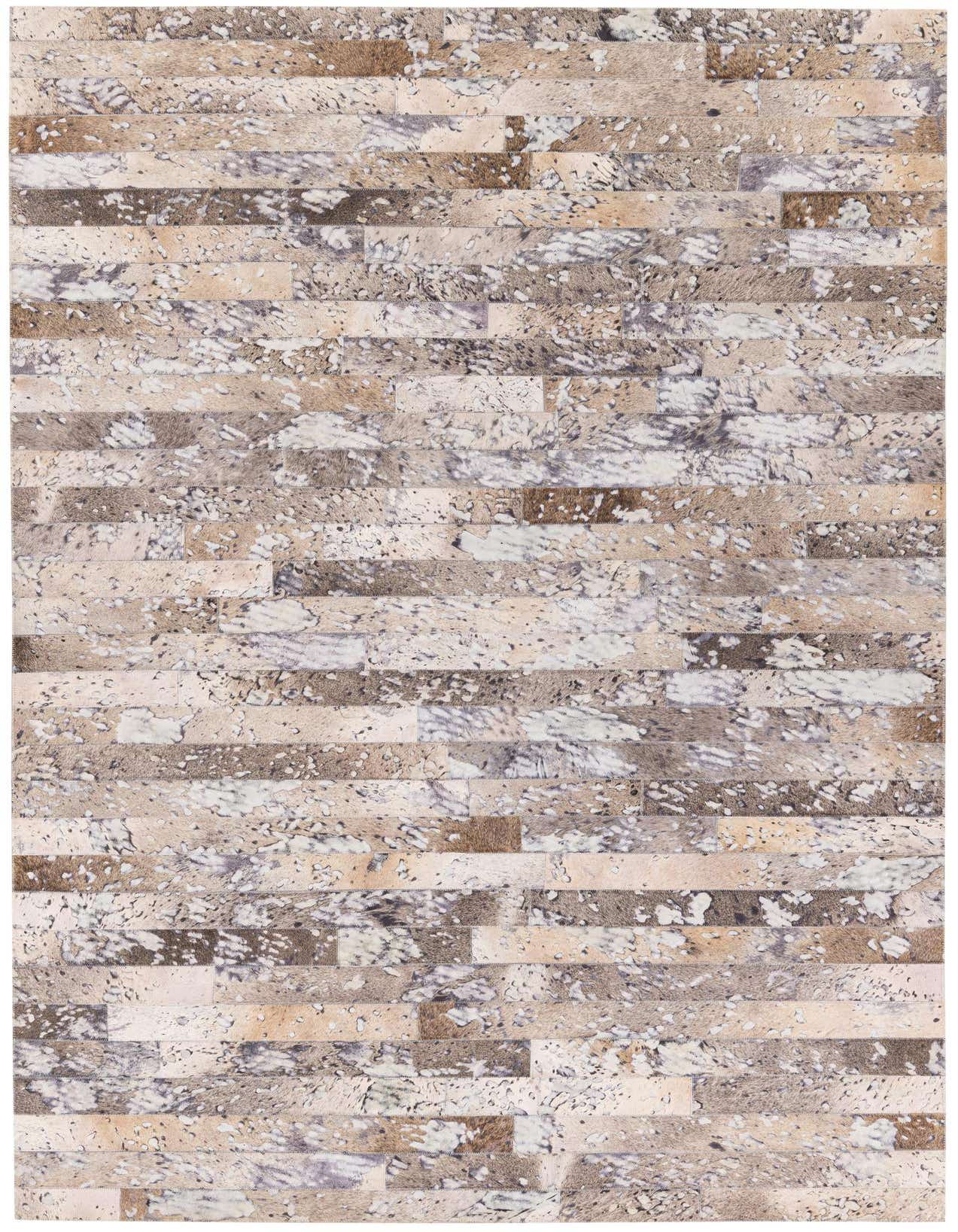 A rectangular 5x8 modern rug featuring a multi-colored abstract pattern of light and dark brown cowhide and leather strips.