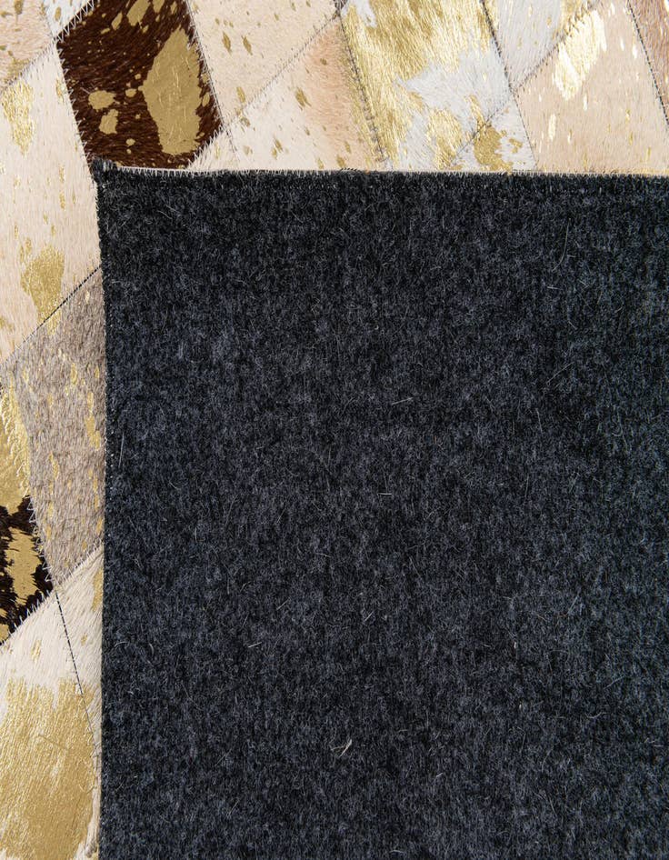 Detail image of  5' x 7' 11 Cowhide Stocks Rug