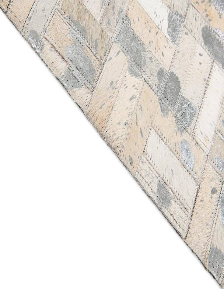 Detail image of  4' 11 x 8' 1 Cowhide Stocks Rug