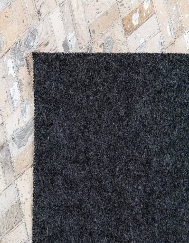 Detail image of  4' 11 x 8' 1 Cowhide Stocks Rug