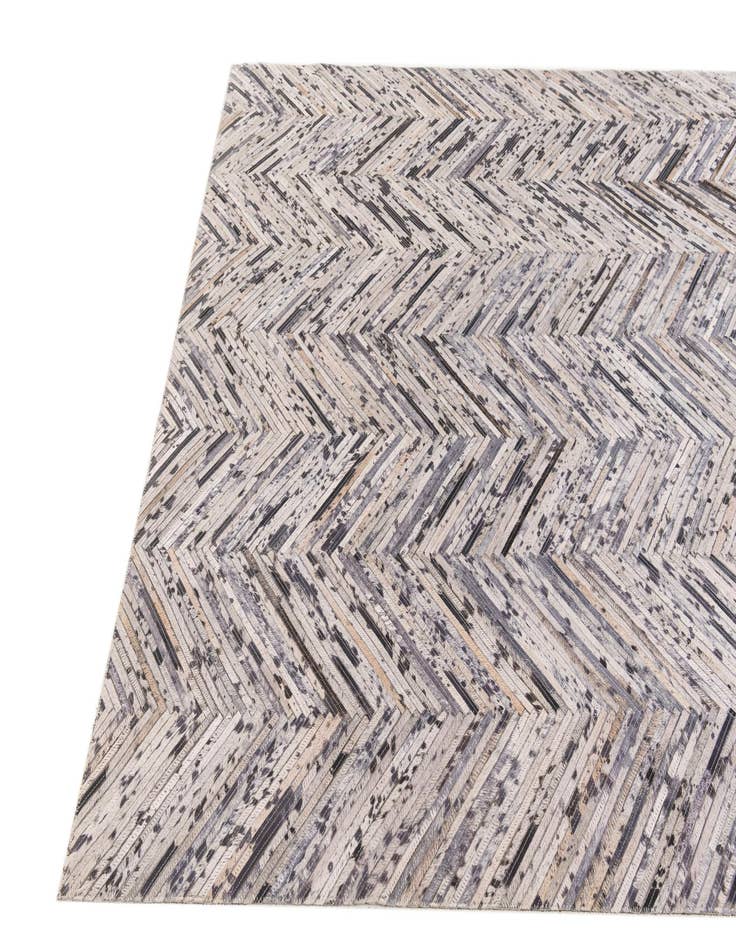 Detail image of  4' 11 x 8' 1 Cowhide Stocks Rug