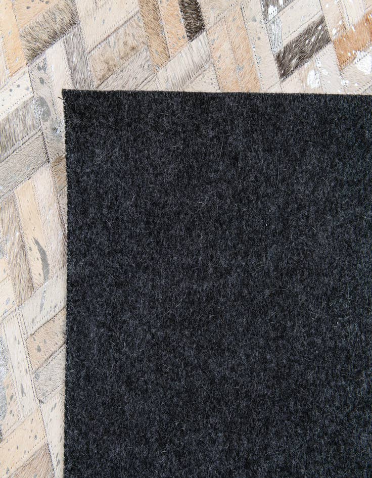 Detail image of  4' 11 x 8' 1 Cowhide Stocks Rug