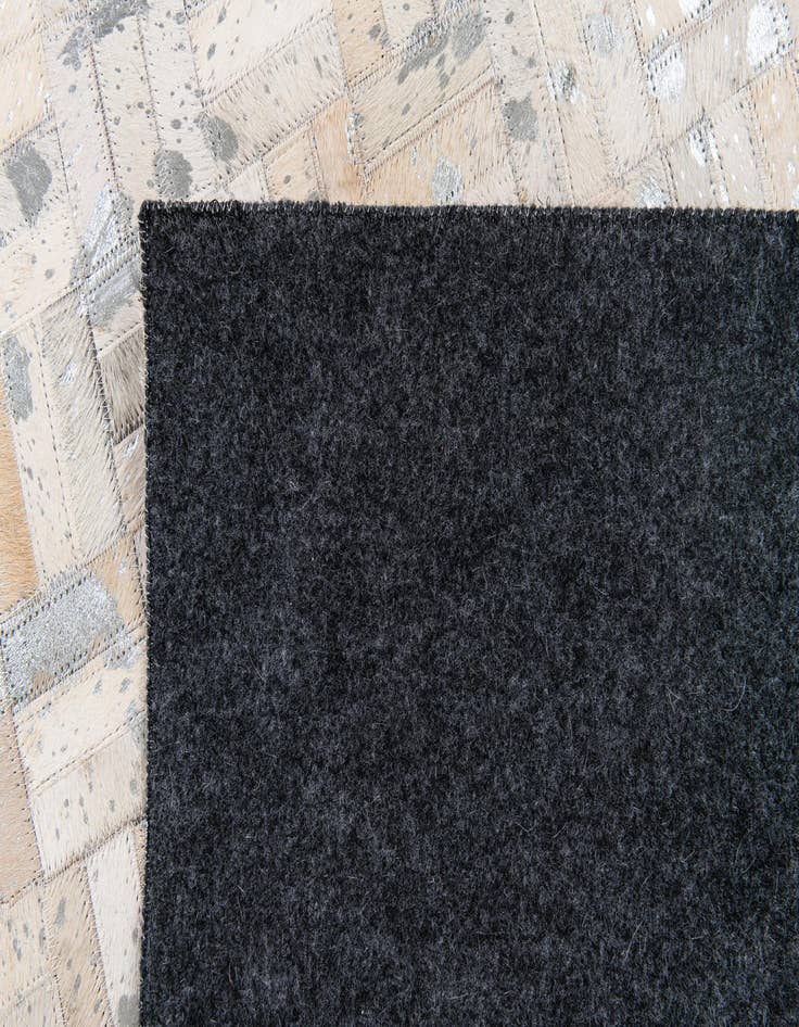 Detail image of  4' 11 x 8' 1 Cowhide Stocks Rug