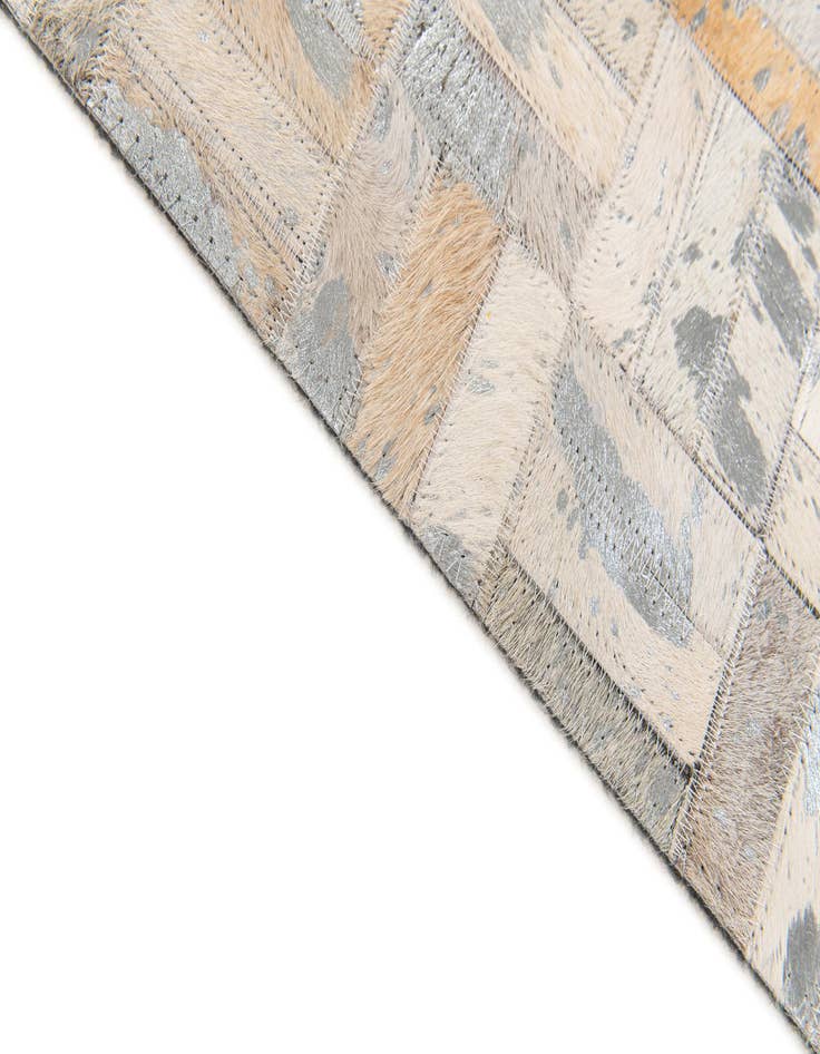 Detail image of  4' 11 x 8' 1 Cowhide Stocks Rug