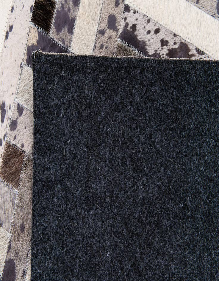Detail image of  5' x 8' Cowhide Stocks Rug