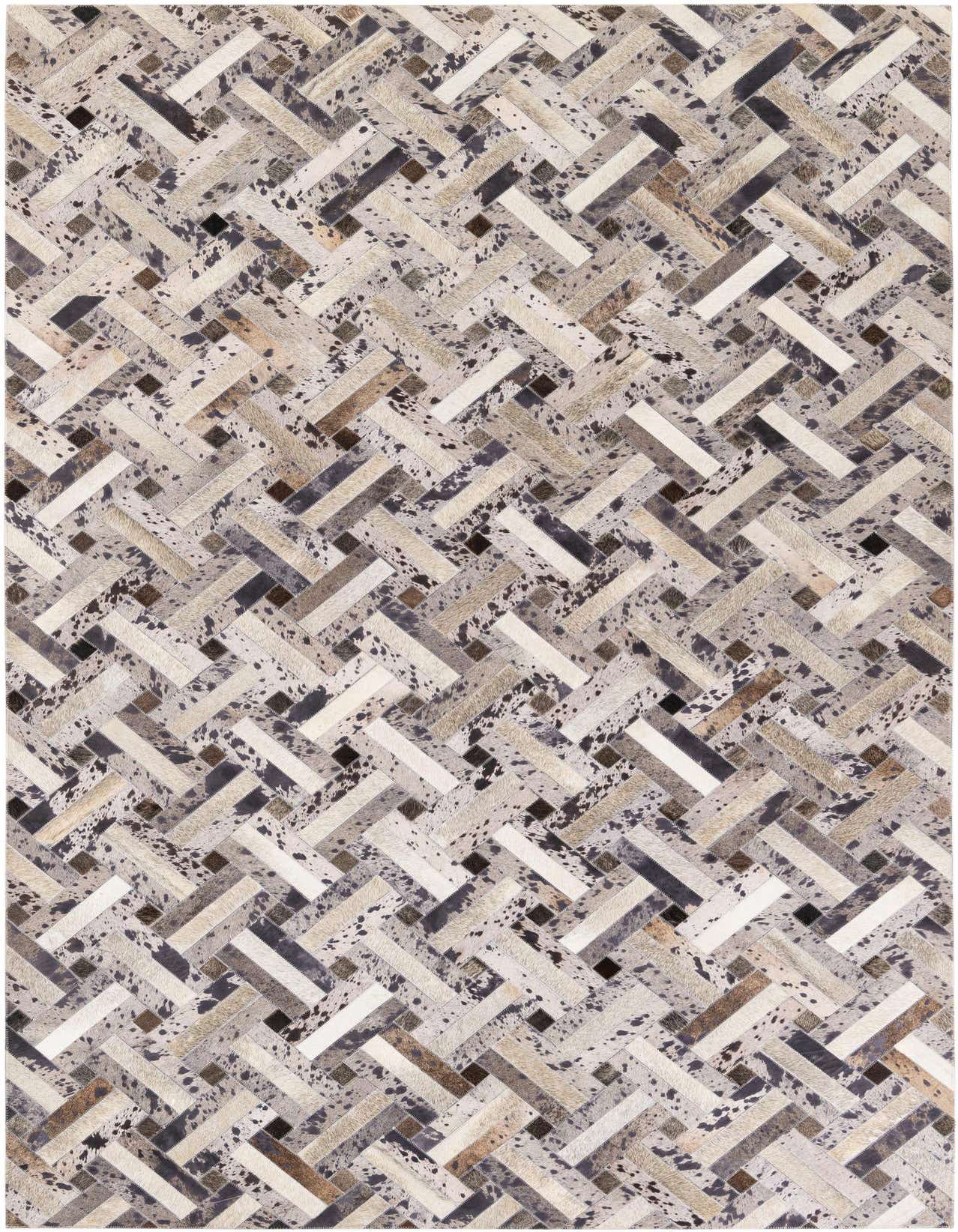 A rectangular 5x8 multi-colored cowhide rug with a modern herringbone pattern, featuring various natural hide shades and textures.