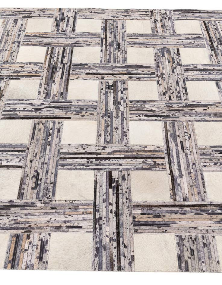 Detail image of  4' 11 x 7' 8 Cowhide Stocks Rug