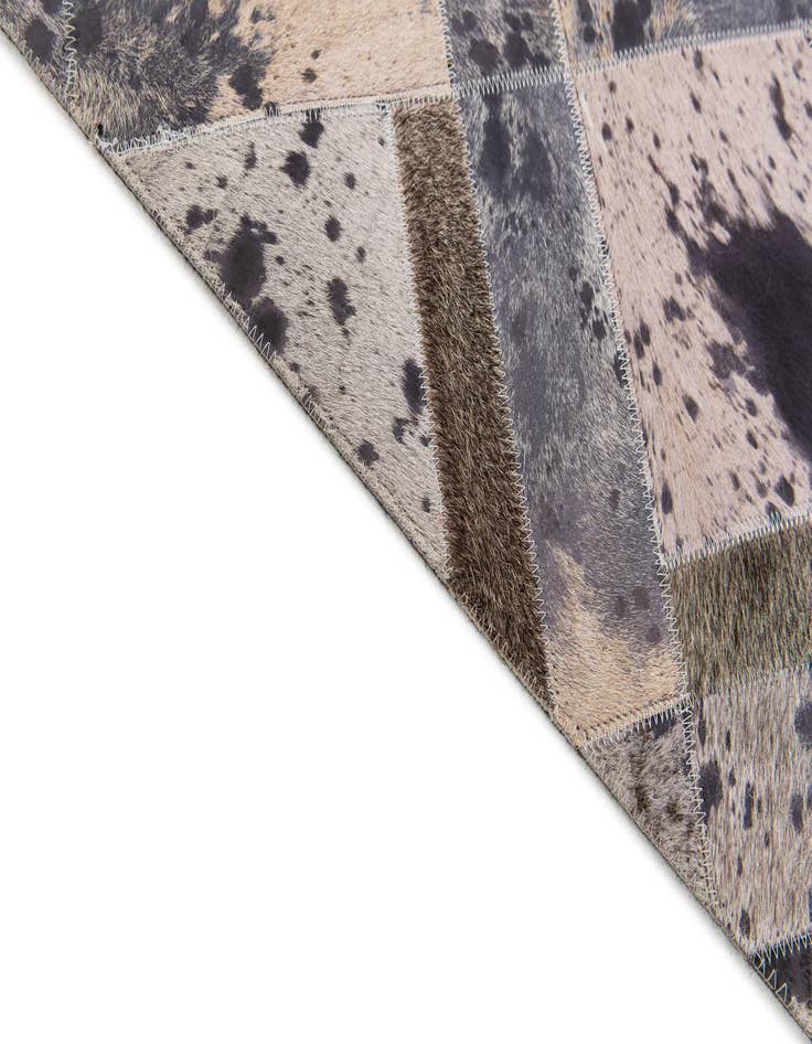 Detail image of  5' 2 x 8' 1 Cowhide Stocks Rug