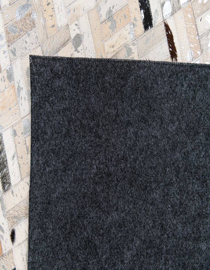 Detail image of  5' x 7' 11 Cowhide Stocks Rug