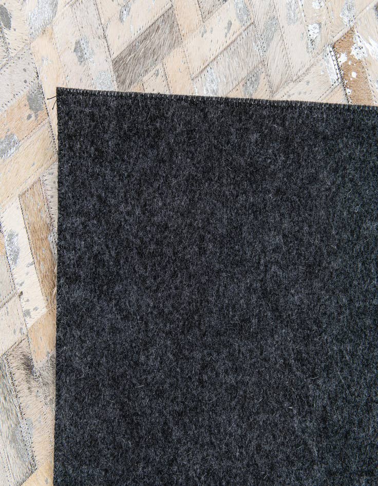 Detail image of  4' 11 x 8' Cowhide Stocks Rug