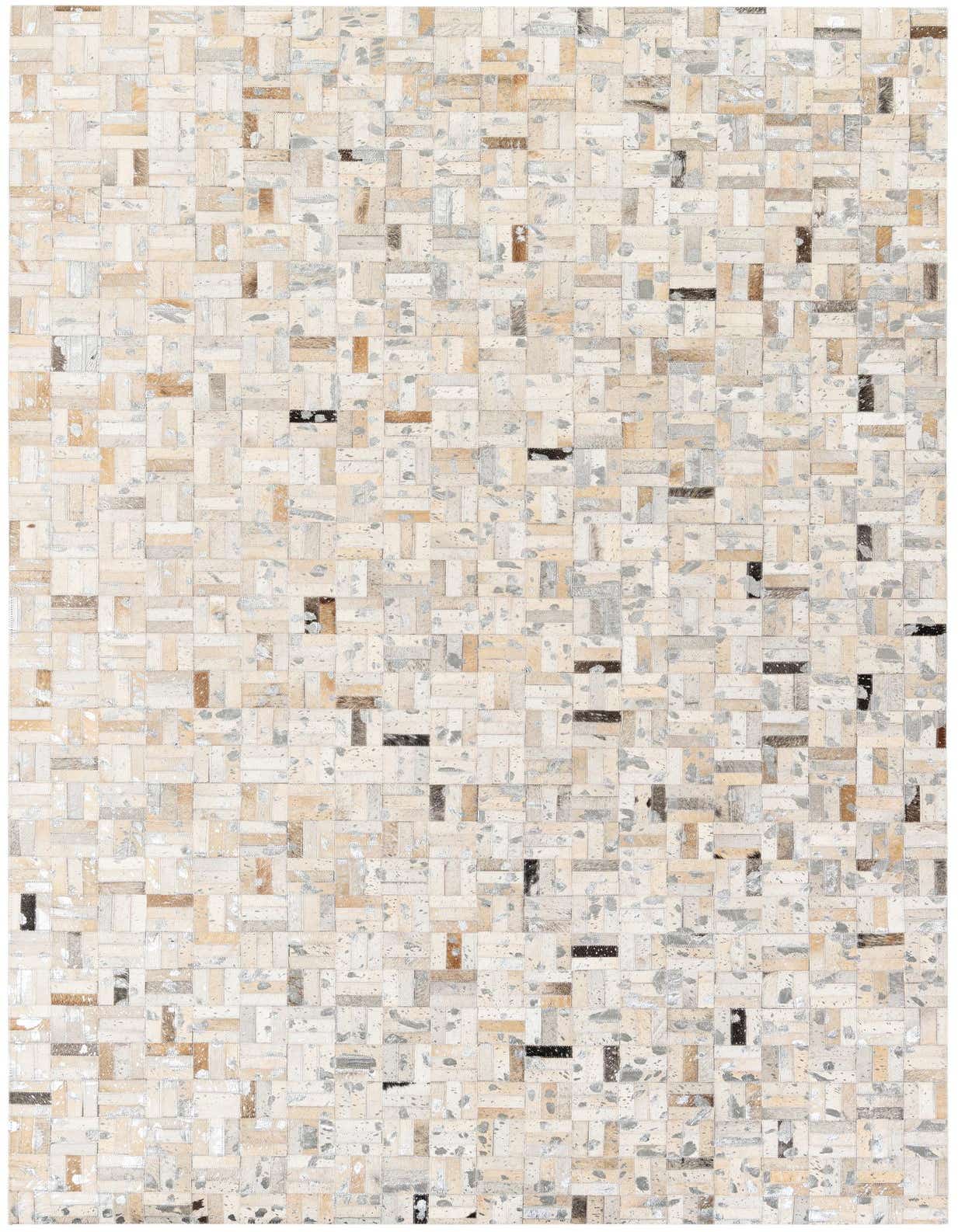 A 5x8 rectangular Cowhide Stocks rug from Rugs.com, featuring a modern patchwork of multi-colored cowhide and leather rectangles in various shades of beige, brown, and gray.
