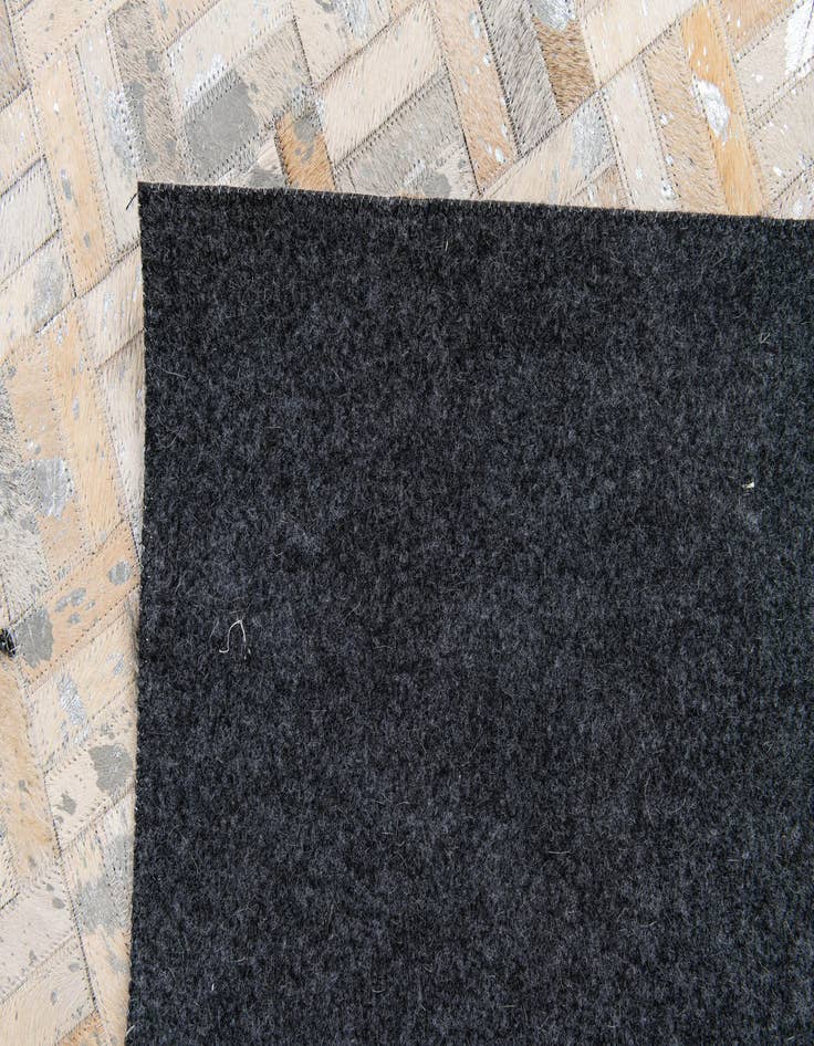 Detail image of  4' 11 x 8' 1 Cowhide Stocks Rug