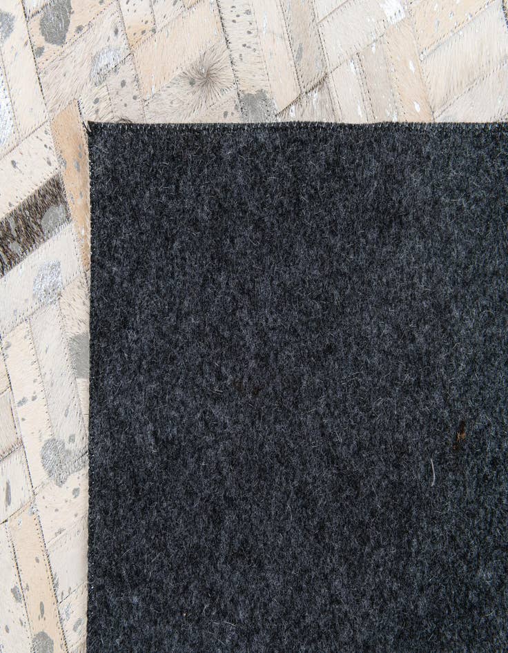 Detail image of  5' x 8' 2 Cowhide Stocks Rug