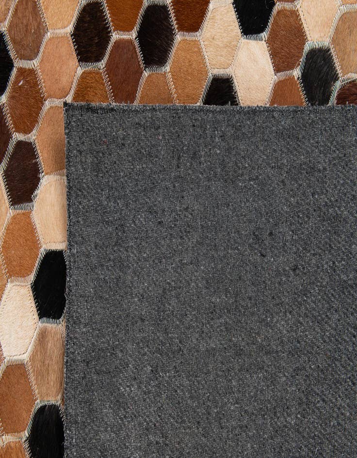 Detail image of  5' 1 x 7' 11 Cowhide Stocks Rug