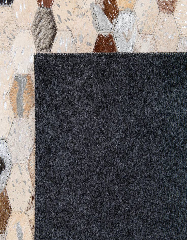 Detail image of  5' 4 x 7' 6 Cowhide Stocks Rug