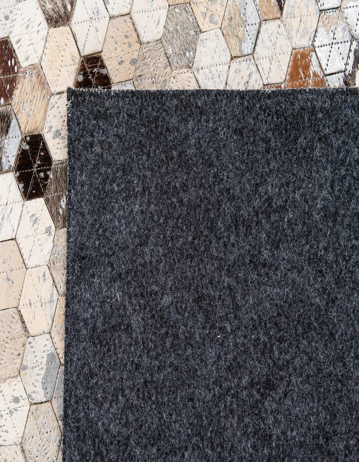 Detail image of  5' 4 x 7' 7 Cowhide Stocks Rug
