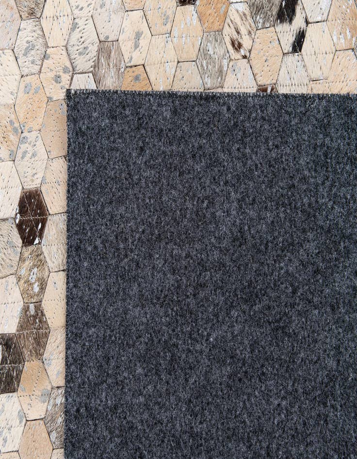 Detail image of  5' 4 x 7' 5 Cowhide Stocks Rug