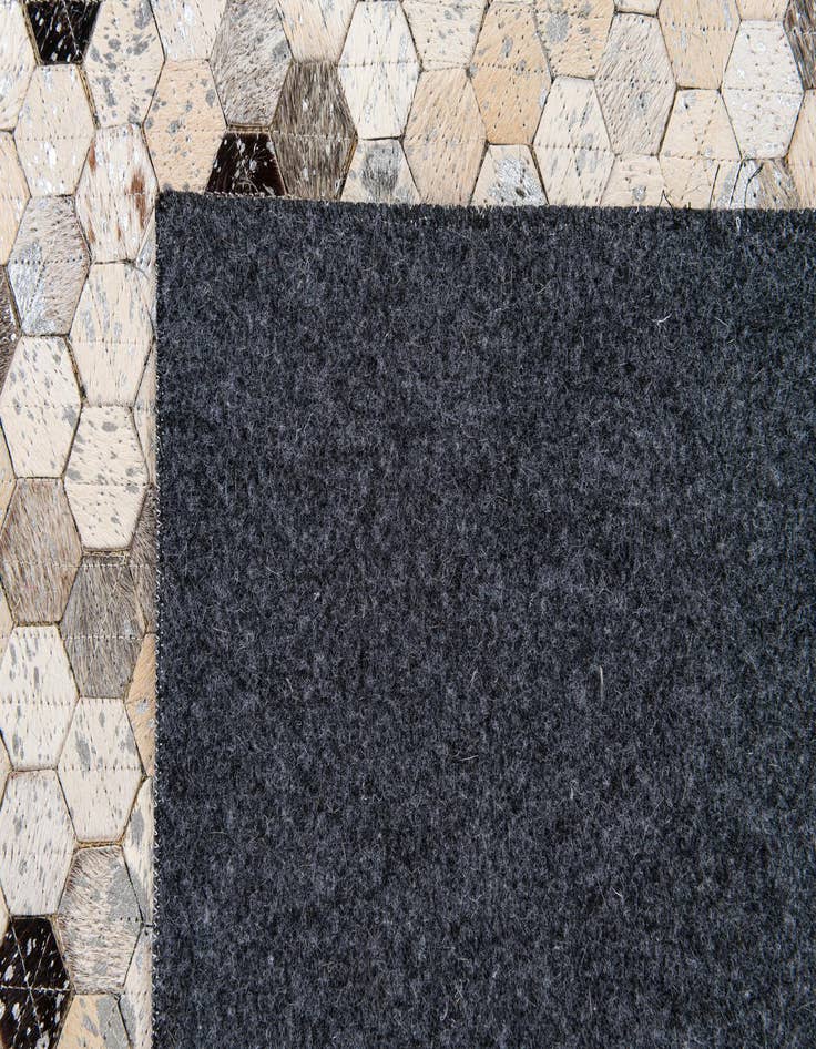 Detail image of  5' 4 x 7' 7 Cowhide Stocks Rug