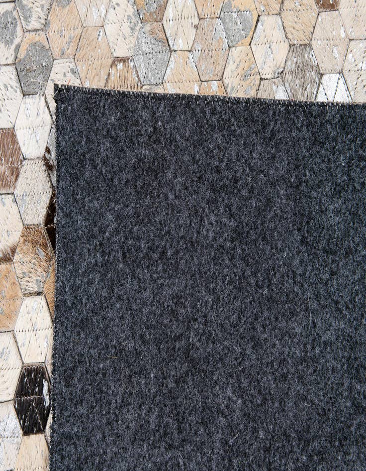 Detail image of  5' 4 x 7' 6 Cowhide Stocks Rug