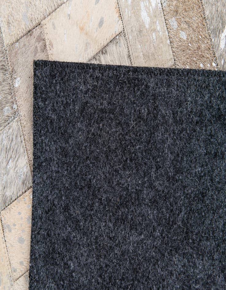 Detail image of  4' 9 x 6' 10 Cowhide Stocks Rug