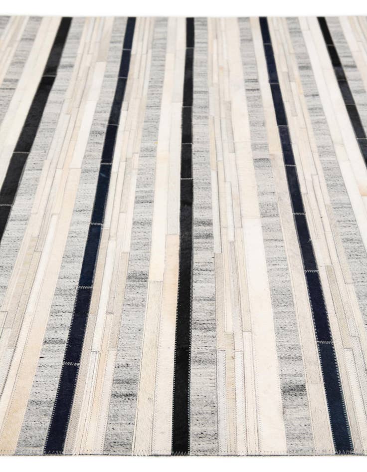 Detail image of  5' 1 x 7' 10 Cowhide Stocks Rug