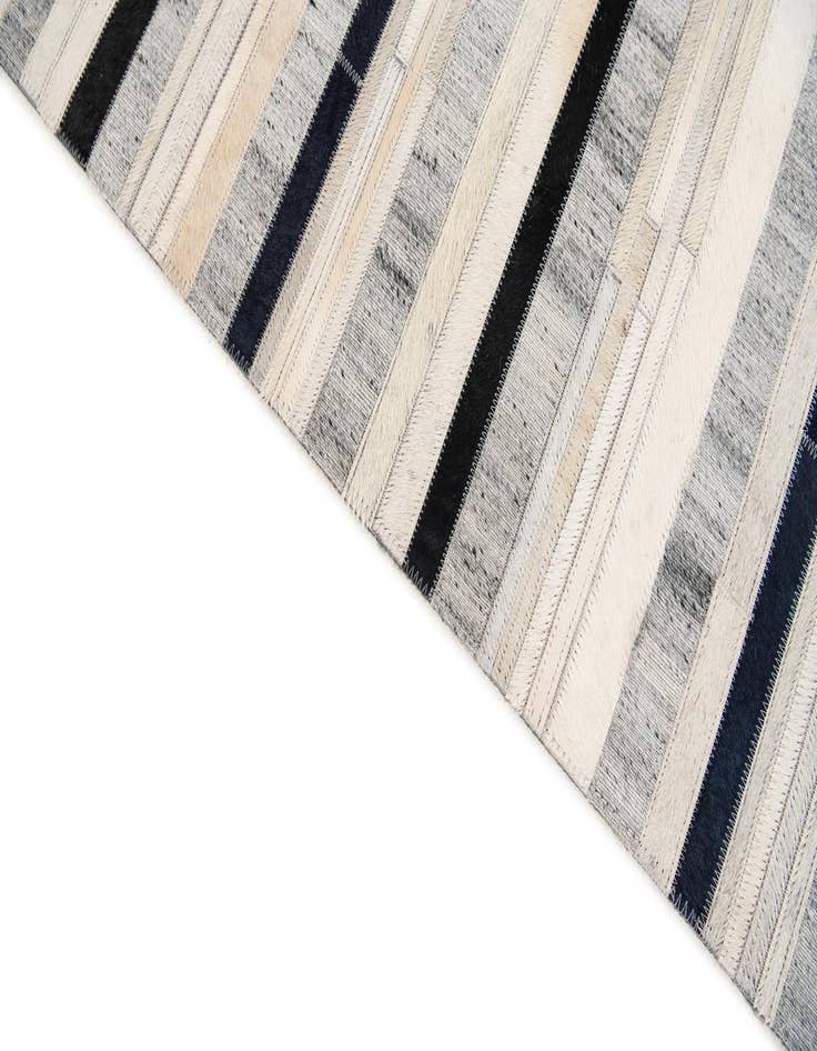 Detail image of  5' 1 x 7' 10 Cowhide Stocks Rug