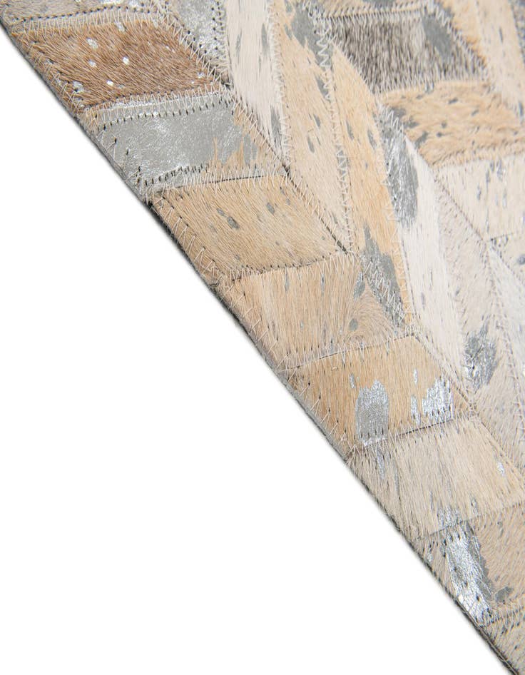 Detail image of  5' 1 x 8' Cowhide Stocks Rug