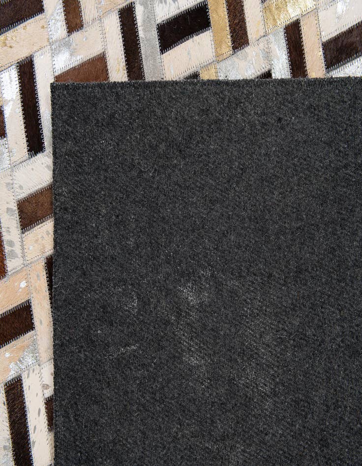 Detail image of  4' 11 x 7' 11 Cowhide Stocks Rug