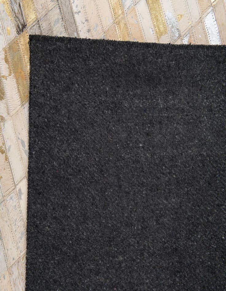 Detail image of  4' 11 x 7' 10 Cowhide Stocks Rug
