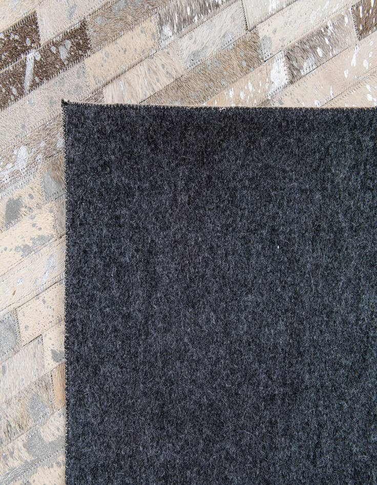 Detail image of  5' 1 x 7' 11 Cowhide Stocks Rug