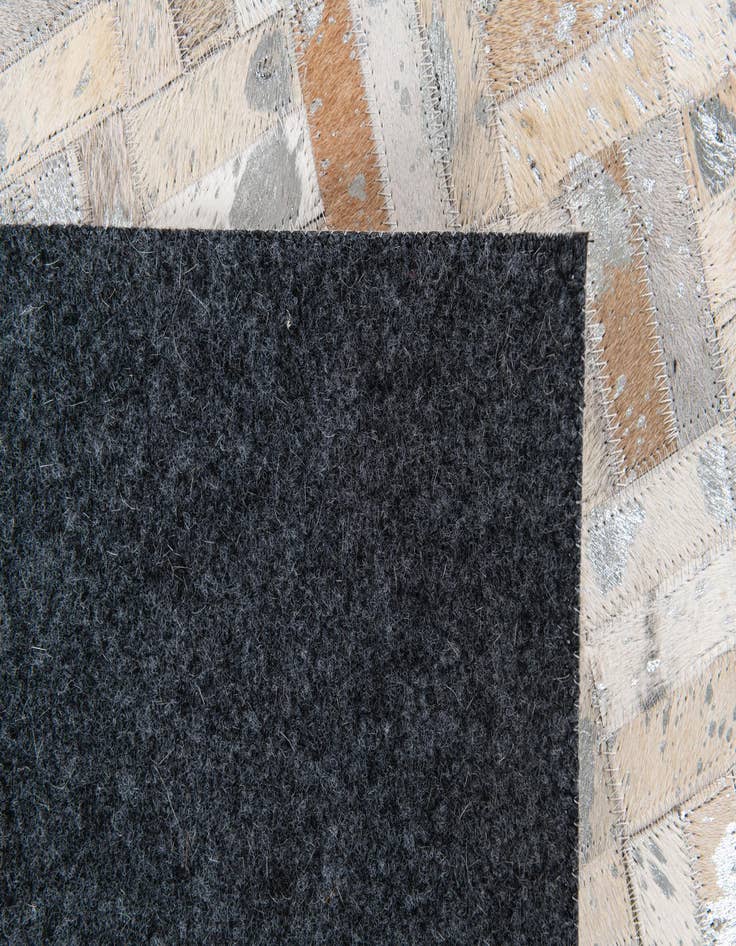 Detail image of  4' 11 x 8' Cowhide Stocks Rug