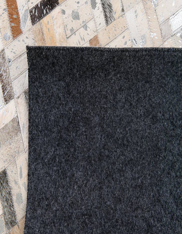 Detail image of  5' 3 x 7' 10 Cowhide Stocks Rug