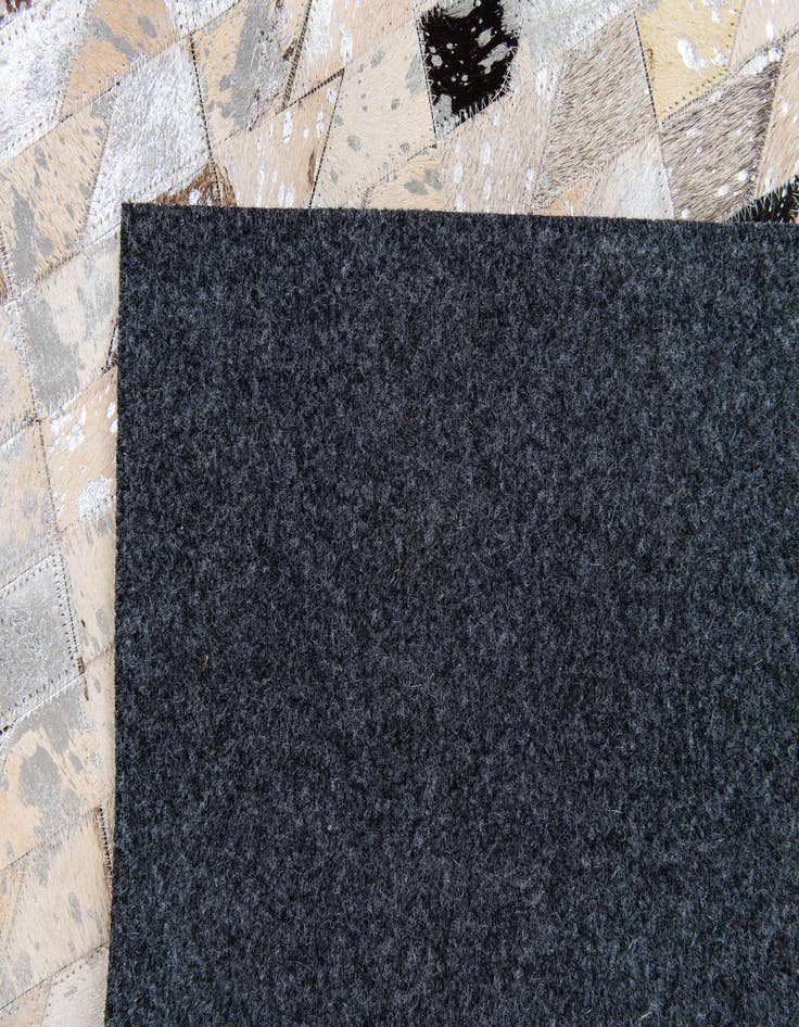 Detail image of  5' 2 x 7' 7 Cowhide Stocks Rug