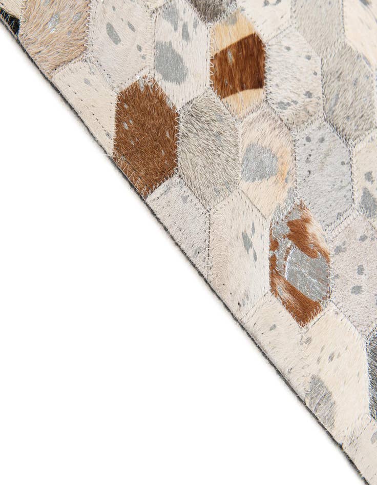 Detail image of  5' x 7' 11 Cowhide Stocks Rug