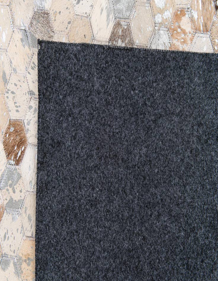 Detail image of  5' 4 x 7' 5 Cowhide Stocks Rug