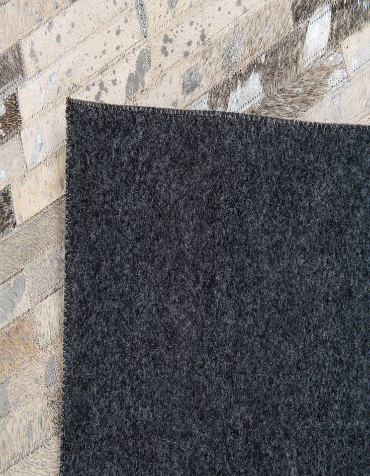 Detail image of  5' 1 x 7' 11 Cowhide Stocks Rug