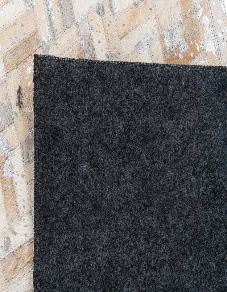 Detail image of  4' 11 x 8' Cowhide Stocks Rug