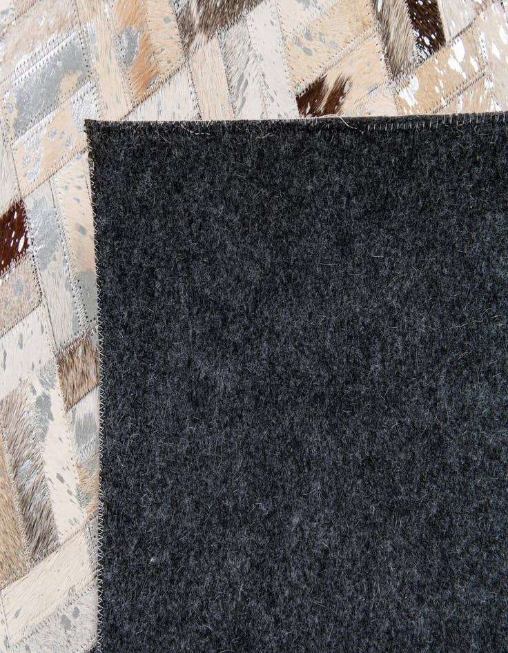 Detail image of  5' x 8' 1 Cowhide Stocks Rug