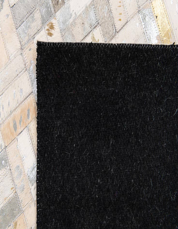 Detail image of  5' x 8' Cowhide Stocks Rug