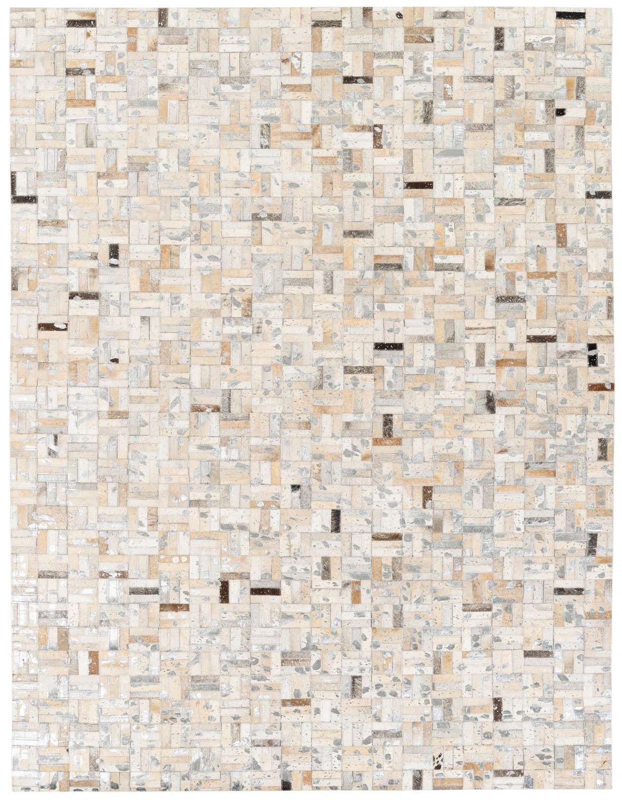 A rectangular 5x8 modern Cowhide Stocks rug featuring a multi-colored patchwork design of natural cowhide and leather pieces.