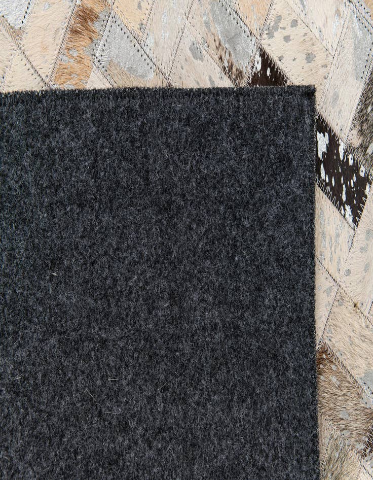 Detail image of  5' 4 x 7' 7 Cowhide Stocks Rug