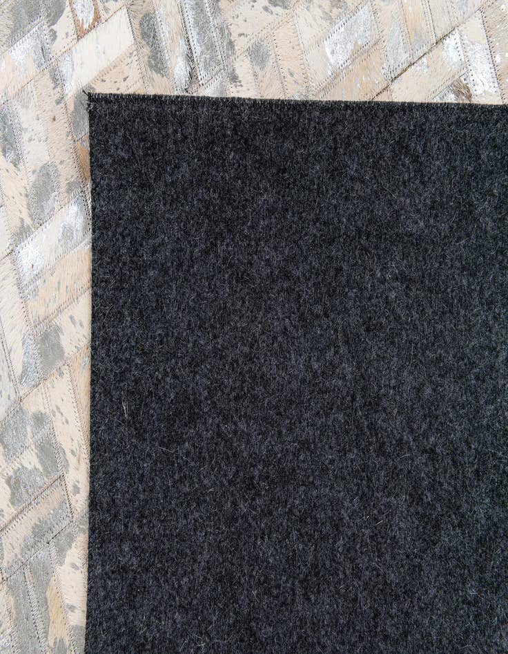 Detail image of  4' 11 x 8' 1 Cowhide Stocks Rug