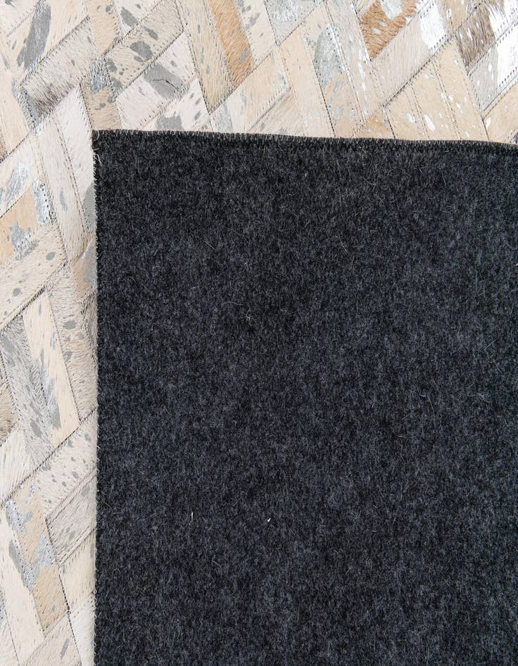 Detail image of  5' x 8' Cowhide Stocks Rug