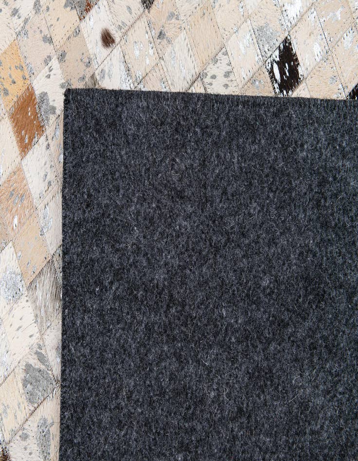 Detail image of  5' 1 x 7' 8 Cowhide Stocks Rug