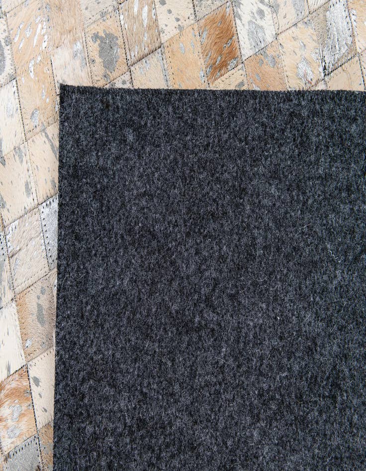 Detail image of  5' 3 x 7' 5 Cowhide Stocks Rug